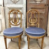 Paire de chaises style Louis XVI en bois doré