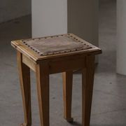 A pair of antique Danish pine stools from the late 19th century.