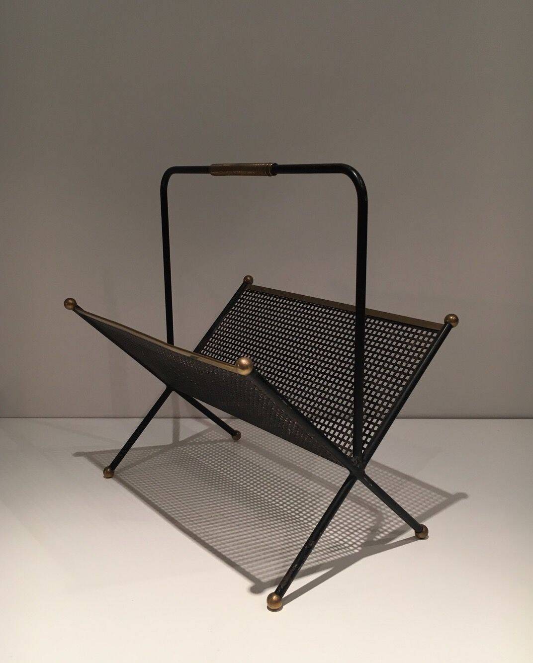 Black lacquered metal design magazine rack, perforated sheet and brass