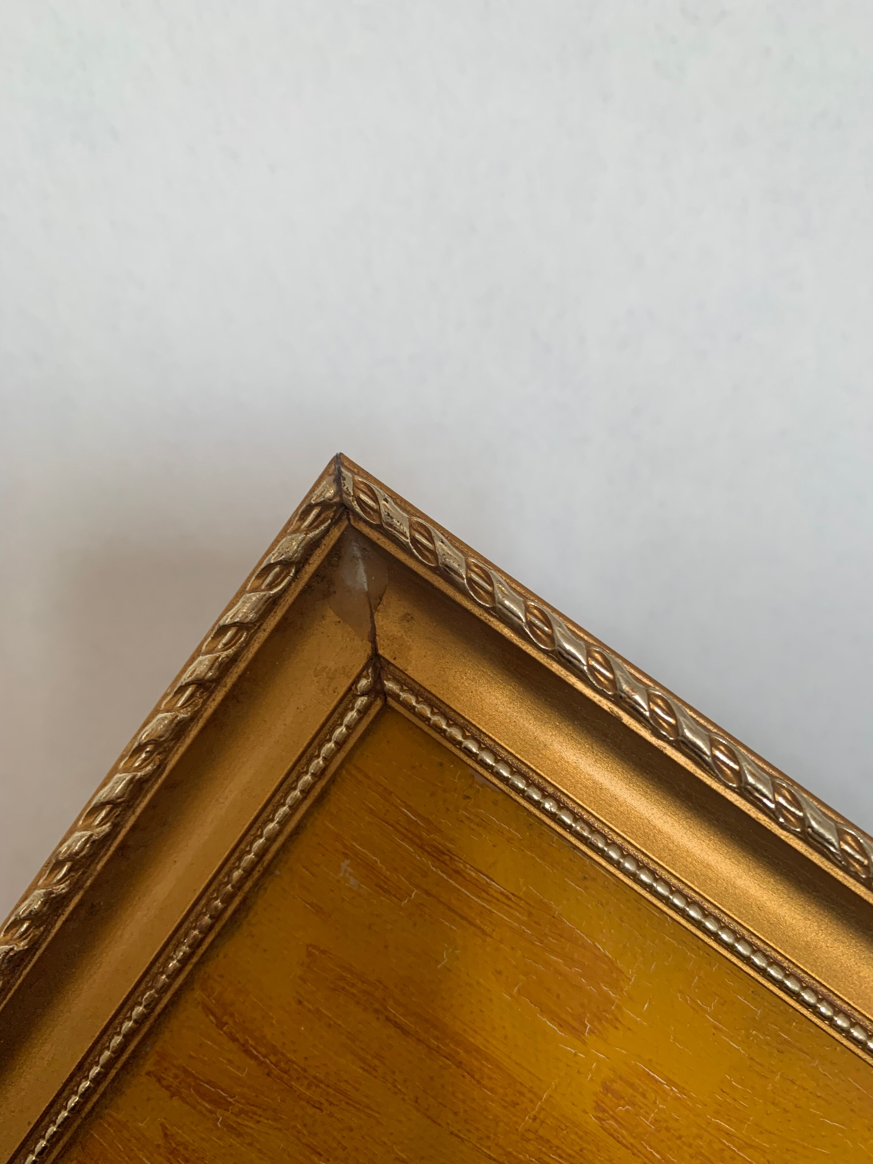 Abstract painting with vintage gilded frame