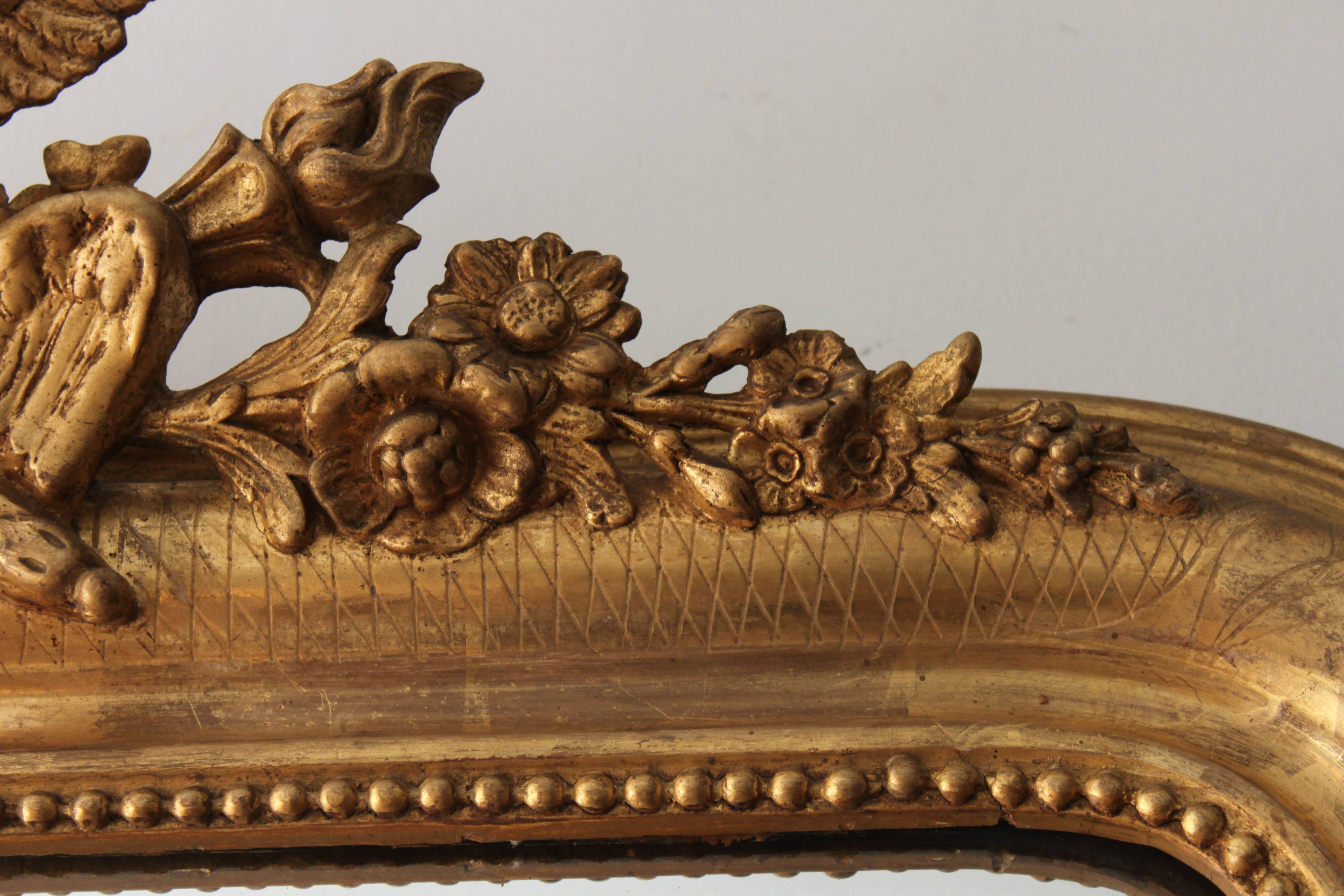 Old gilded mirror with A pediment