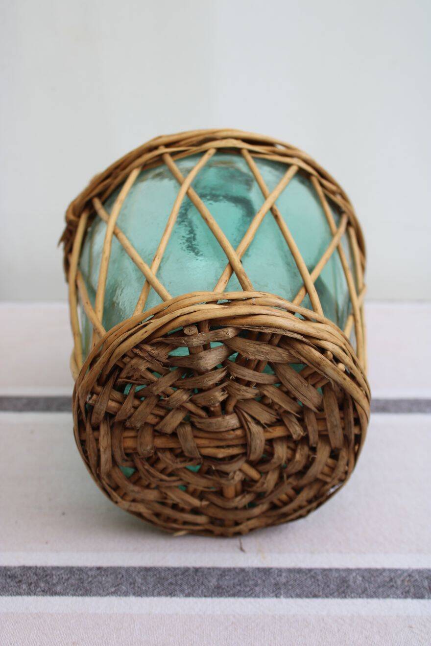 Glass and wicker demijohn