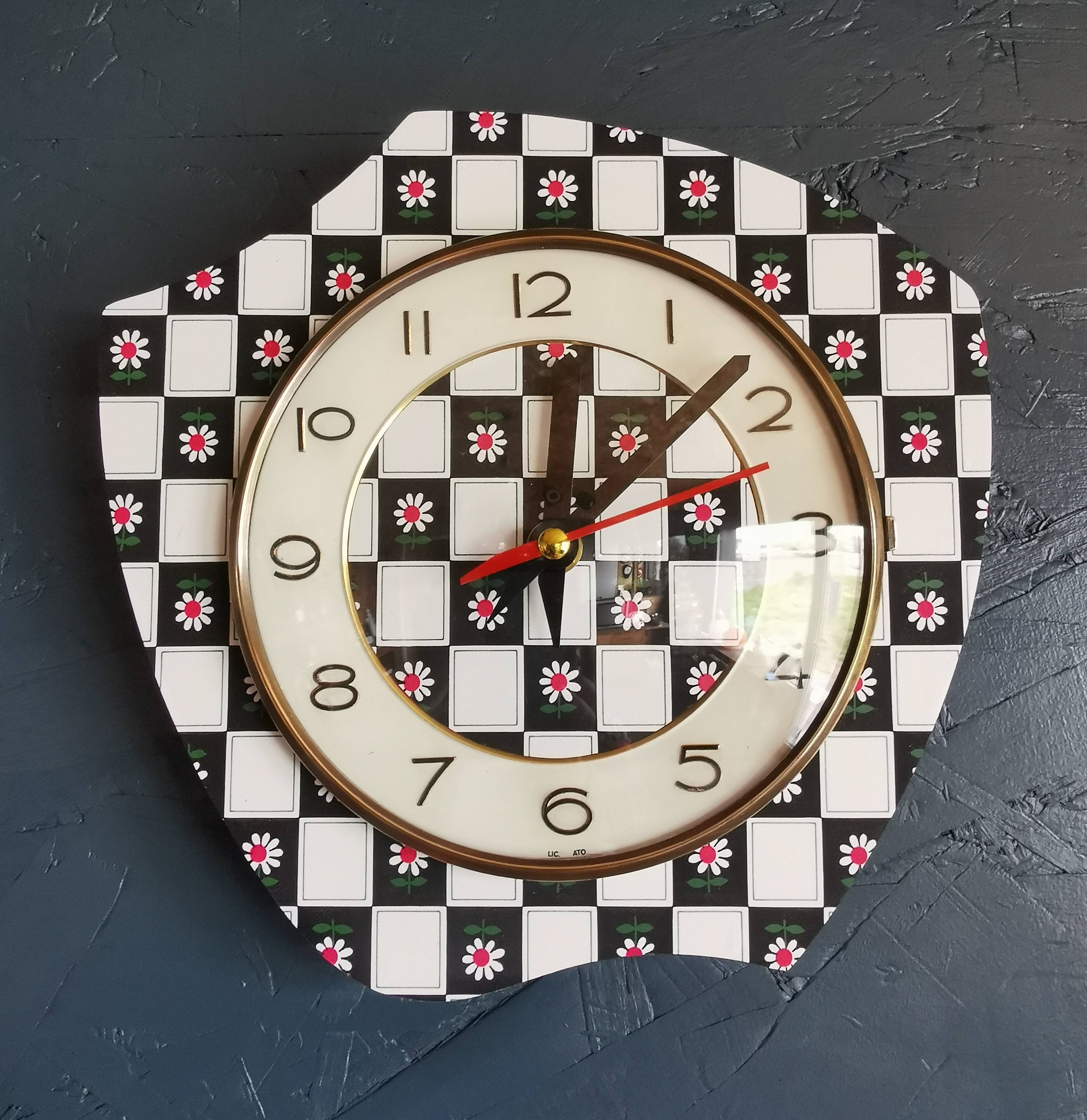 Vintage silent asymmetrical wall pendulum clock "Black and white checkered flowers"