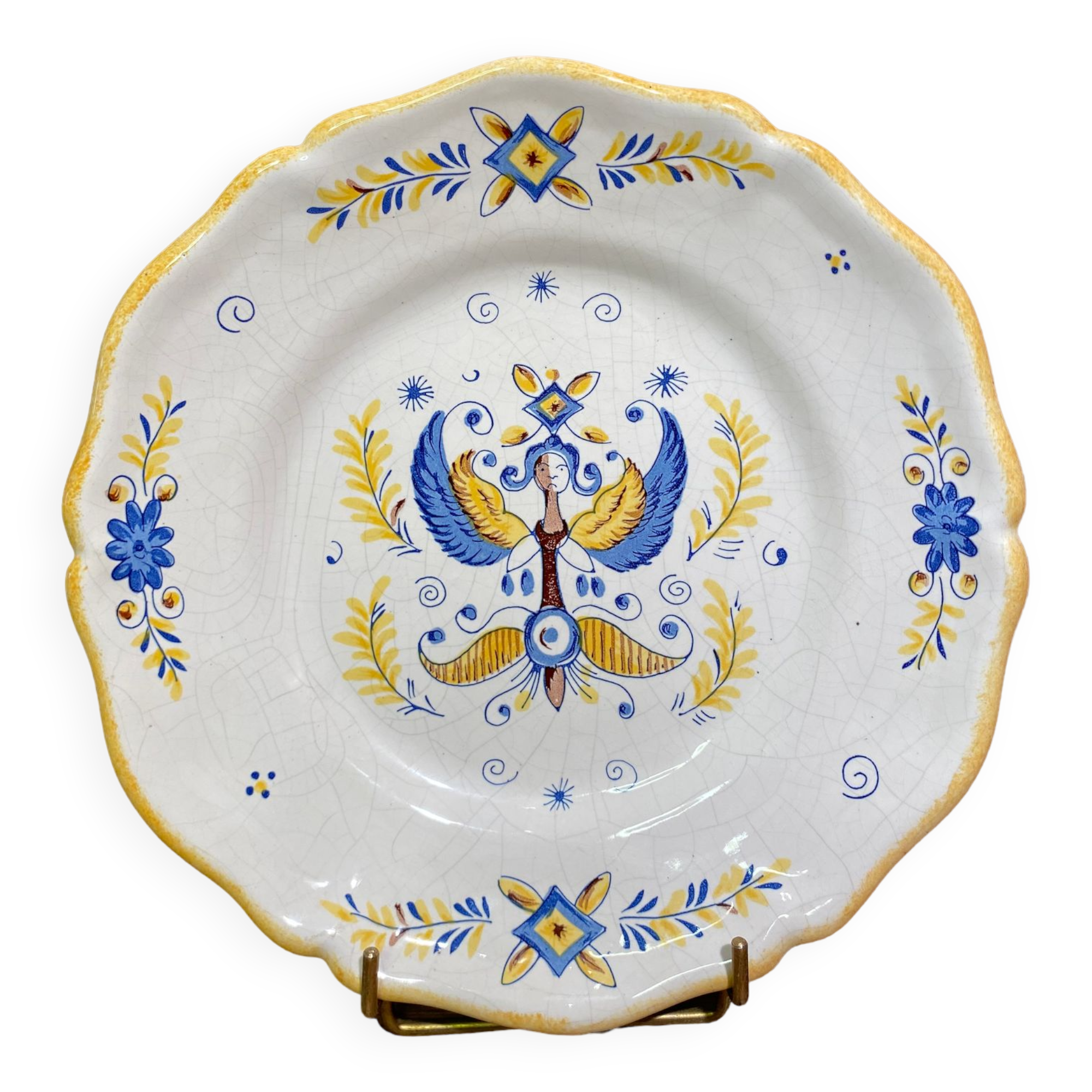 Earthenware plate decorated with winged character decoration in Nevers style, Auxerrois