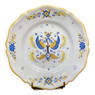 Earthenware plate decorated with winged character decoration in Nevers style, Auxerrois