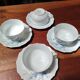 Set of 4 Limoges porcelain cups and saucers.