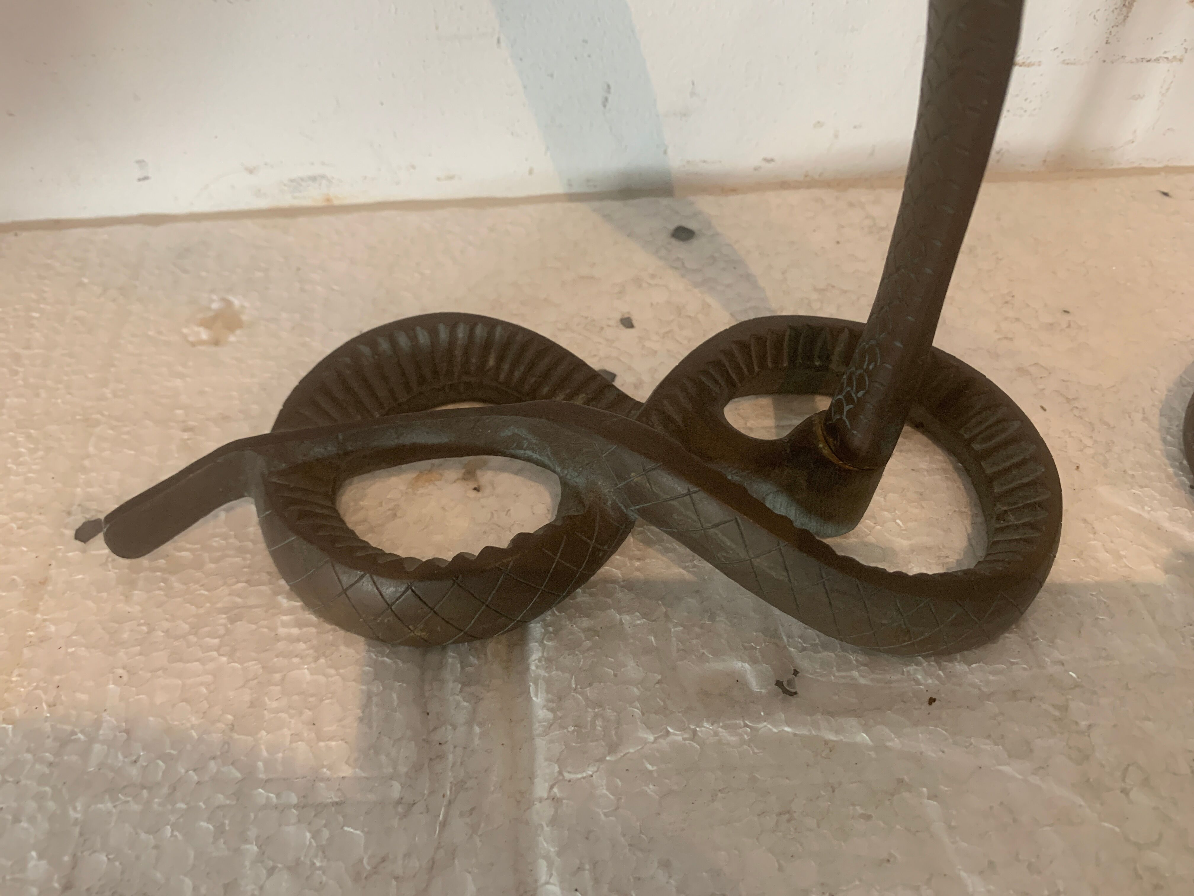 Pair of bronze sconces decorated with a snake XX century