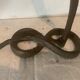 Pair of bronze sconces decorated with a snake XX century