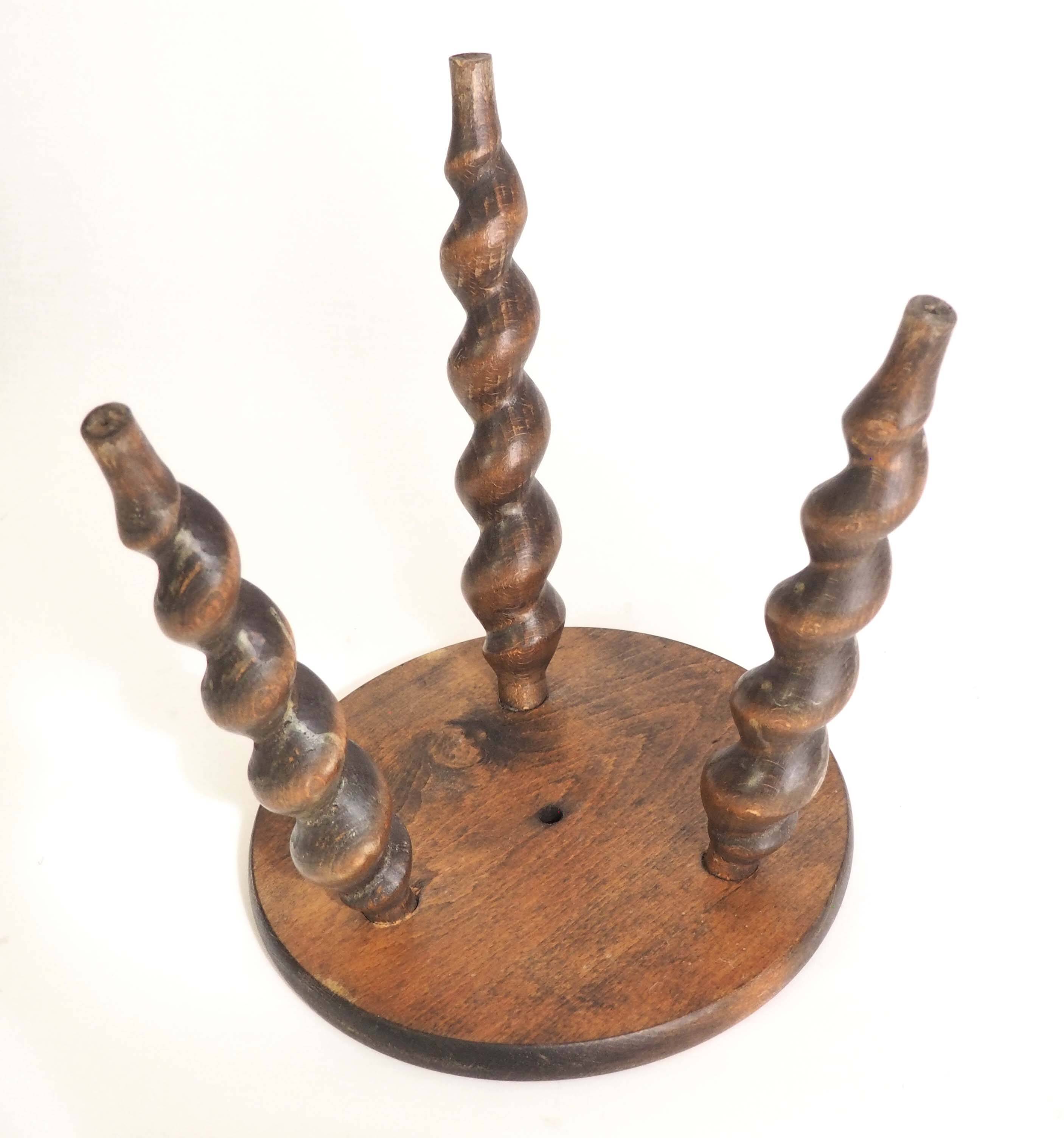 Spiral leg tripod stool