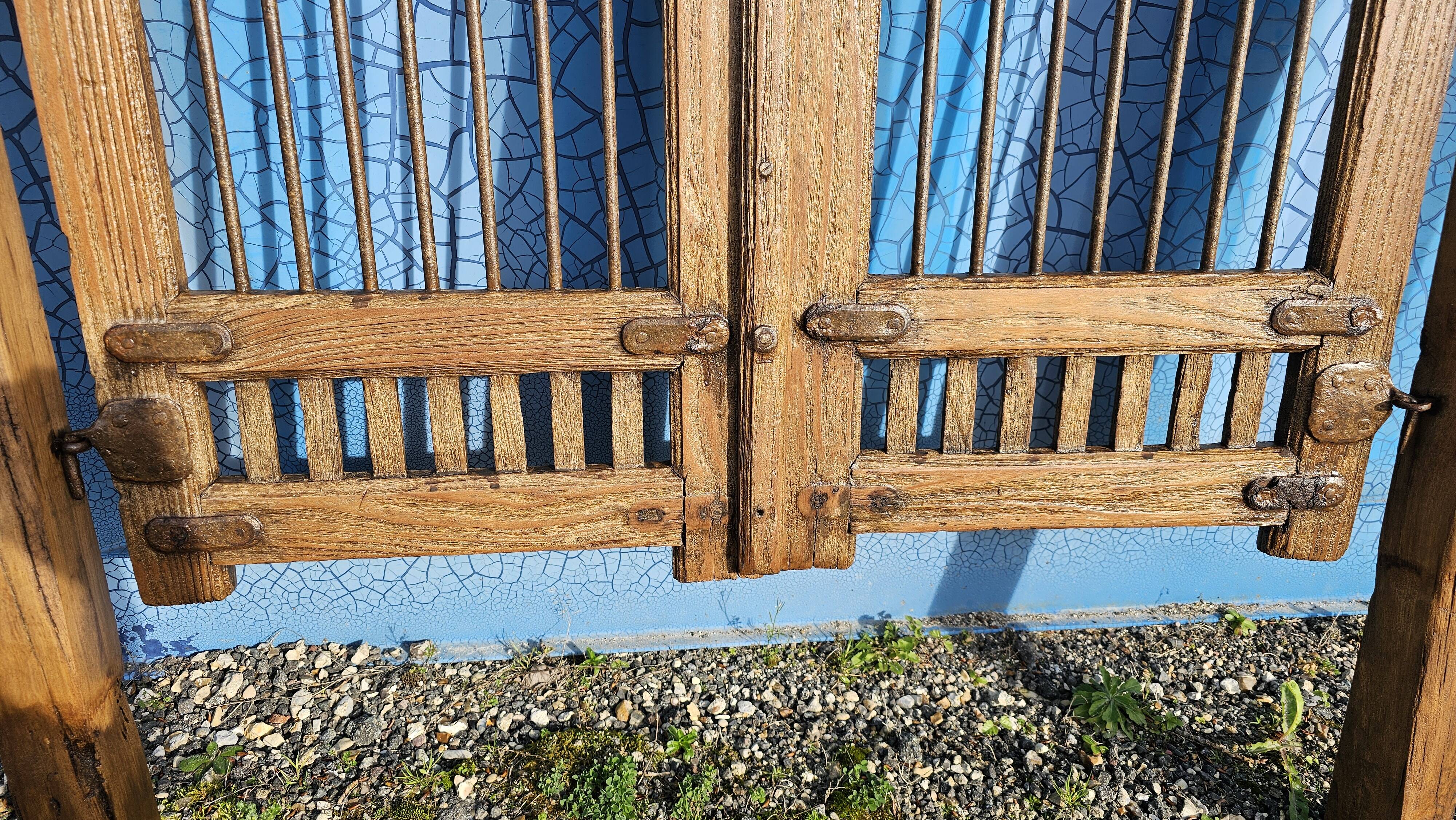 Old garden gate in solid teak