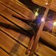 Vintage coffee table from the 60s and 70s by Hugues POIGNANT, smoked glass & teak.