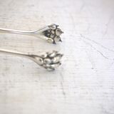 Silver metal candy box and pliers