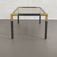 Gunmetal gold metal and smoked glass coffee table from the 70s