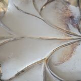 Old empty cut pocket in silver metal art nouveau in the shape of a sheet