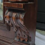 Old large carved wooden mirror