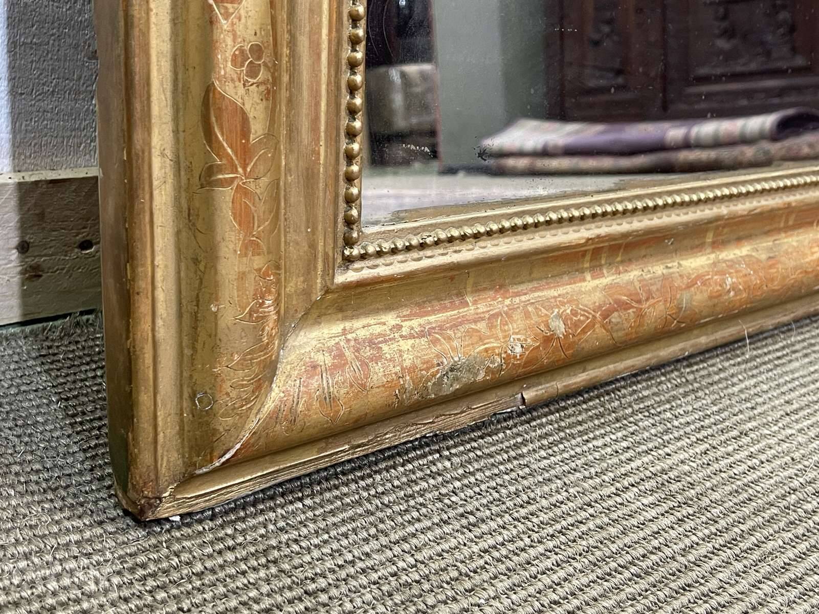 Miroir Louis XV fin XIXème en bois doré