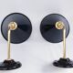 Pair of antique black enamelled sheet metal wall lights