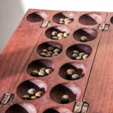 Awalé african wooden games