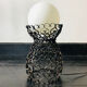 Lampe en fer forgé noir et globe en verre blanc
