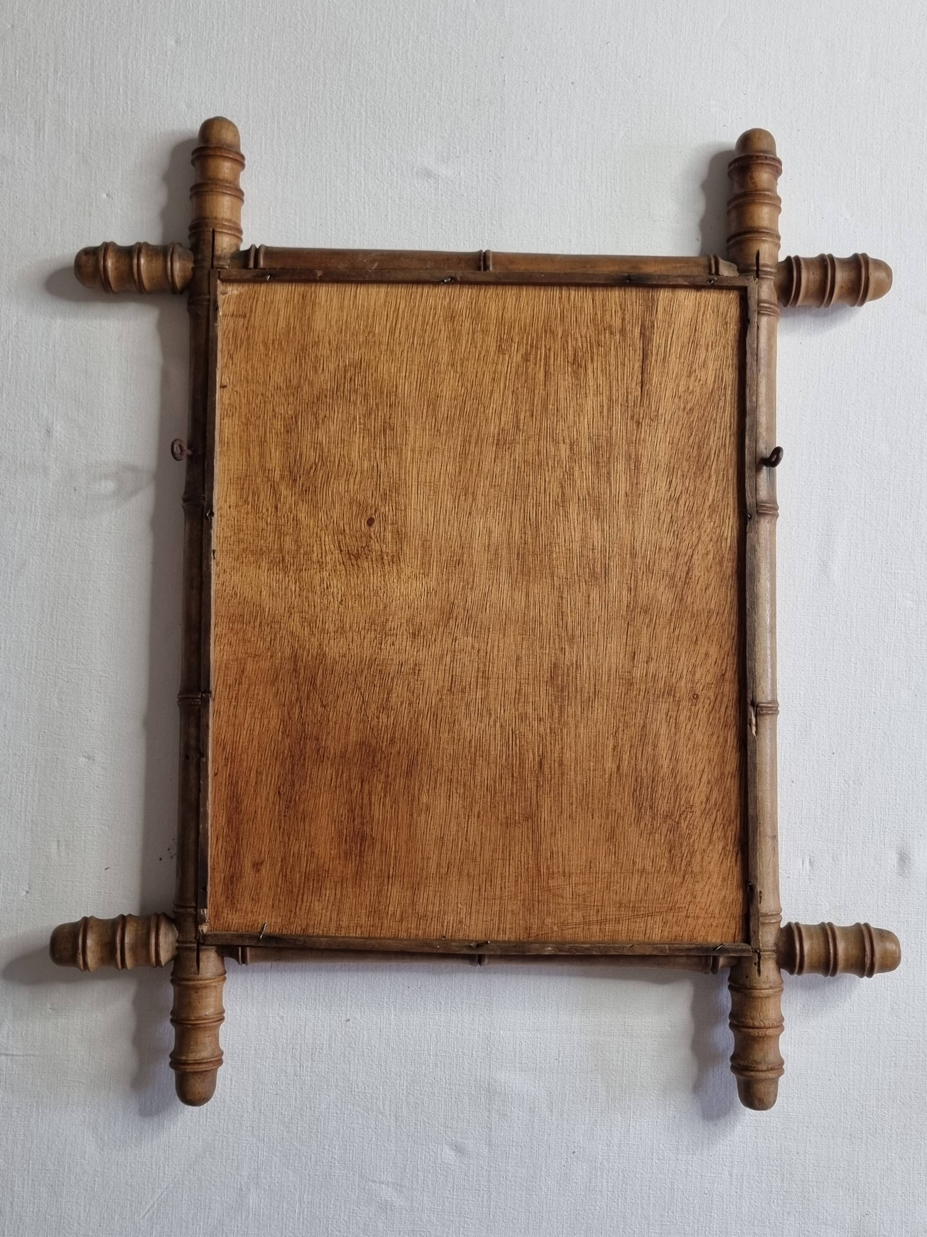 Miroir en bois tourné à l'imitation du bambou, des années 20-30, 42 x 49 cm