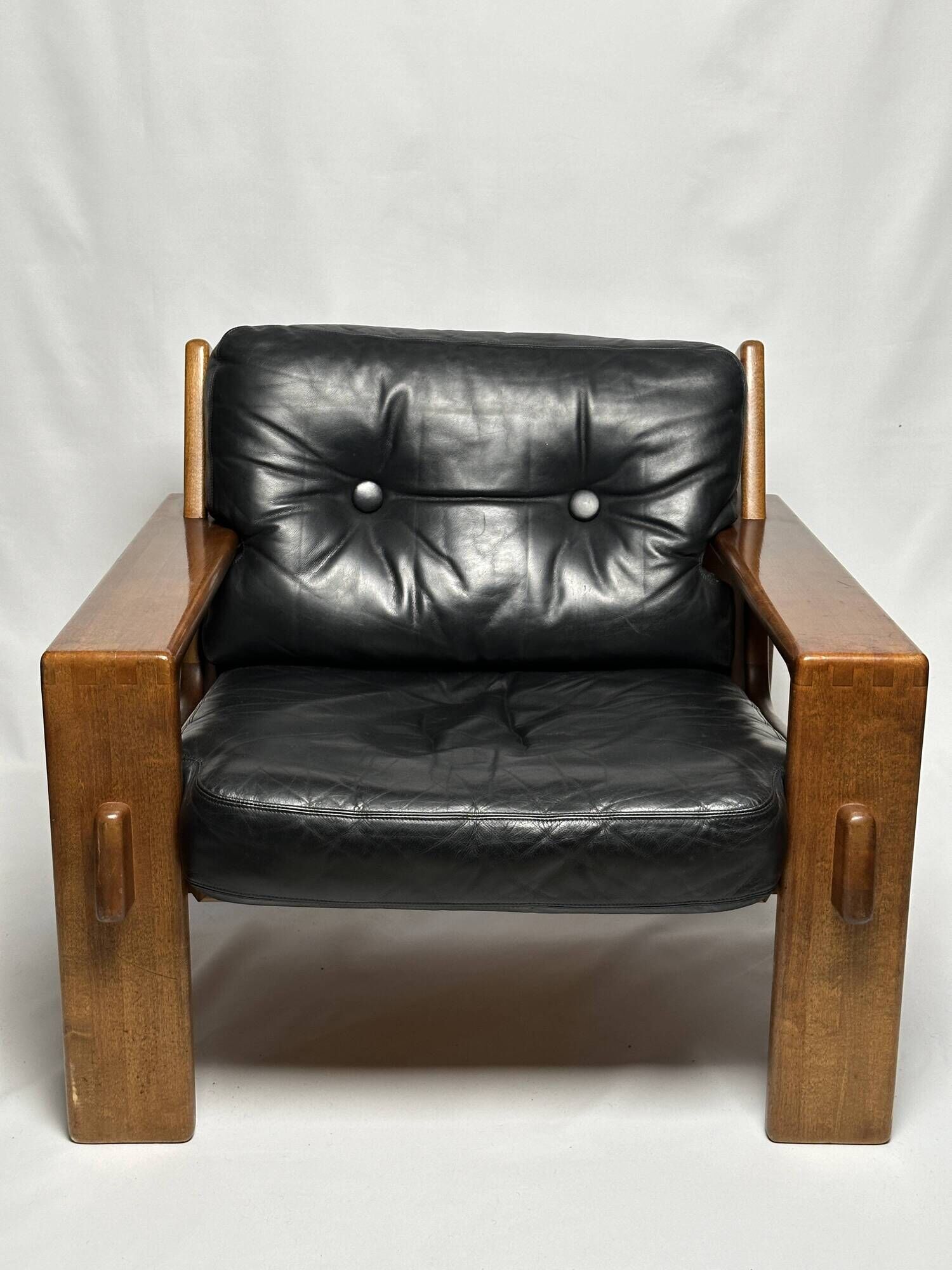 Black leather and wood armchair by Esko Pajamies, 1960s, Finland.