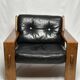 Black leather and wood armchair by Esko Pajamies, 1960s, Finland.
