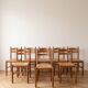 Set of 8 vintage wooden chairs with rush seats.