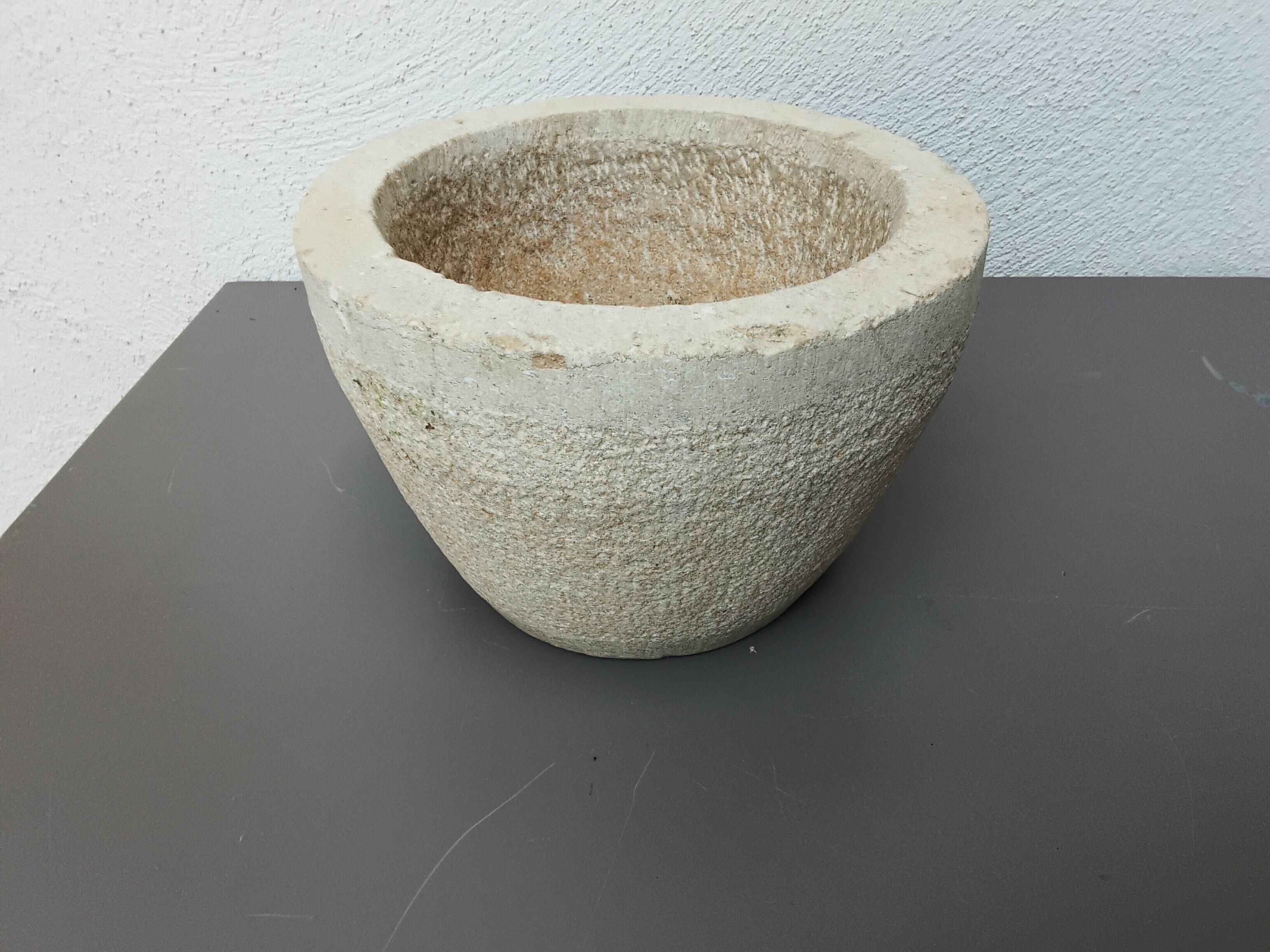 Stone mortar with wooden pestle