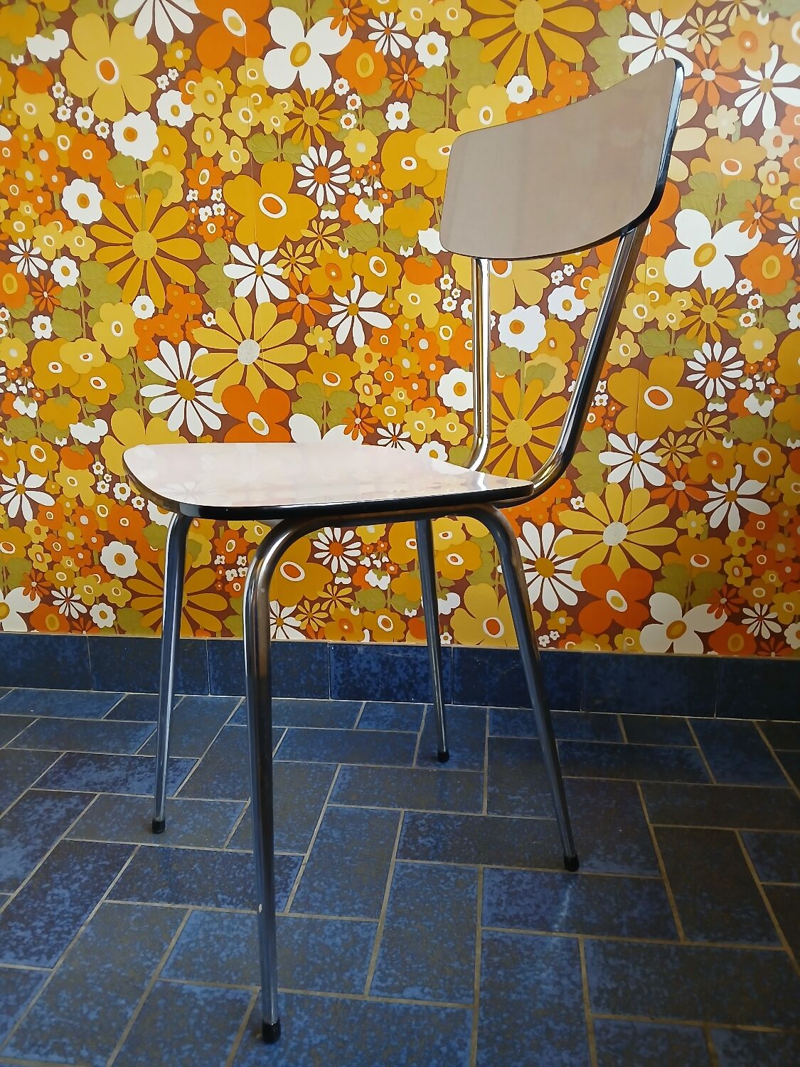 Extendable formica table and vintage 1960s chairs.