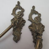 Pair of embraces in numerotée solid brass, rocaille style