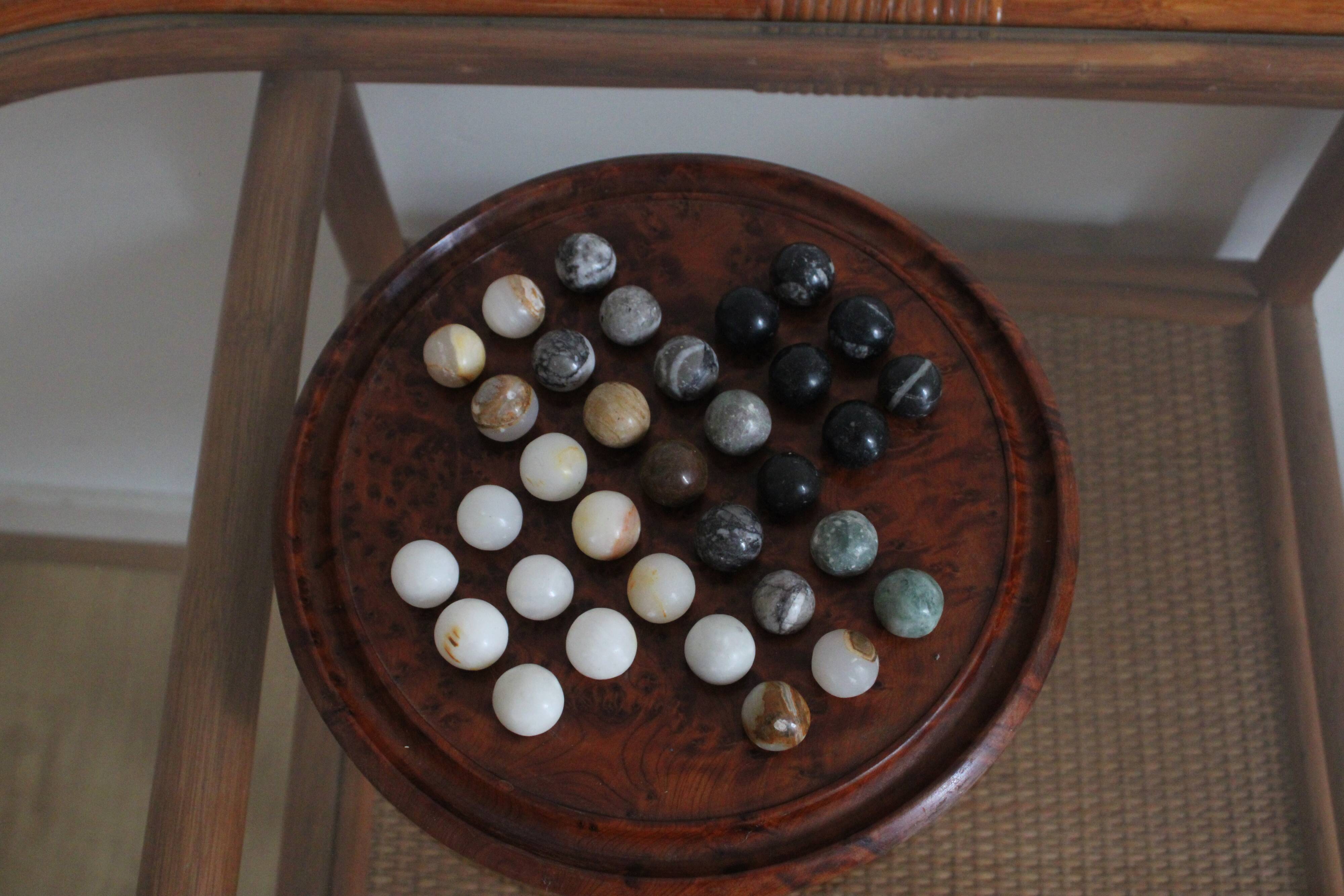 Solitaire game or mineral abacus
