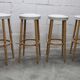 Standing table and 4 high stools Baumann 1990
