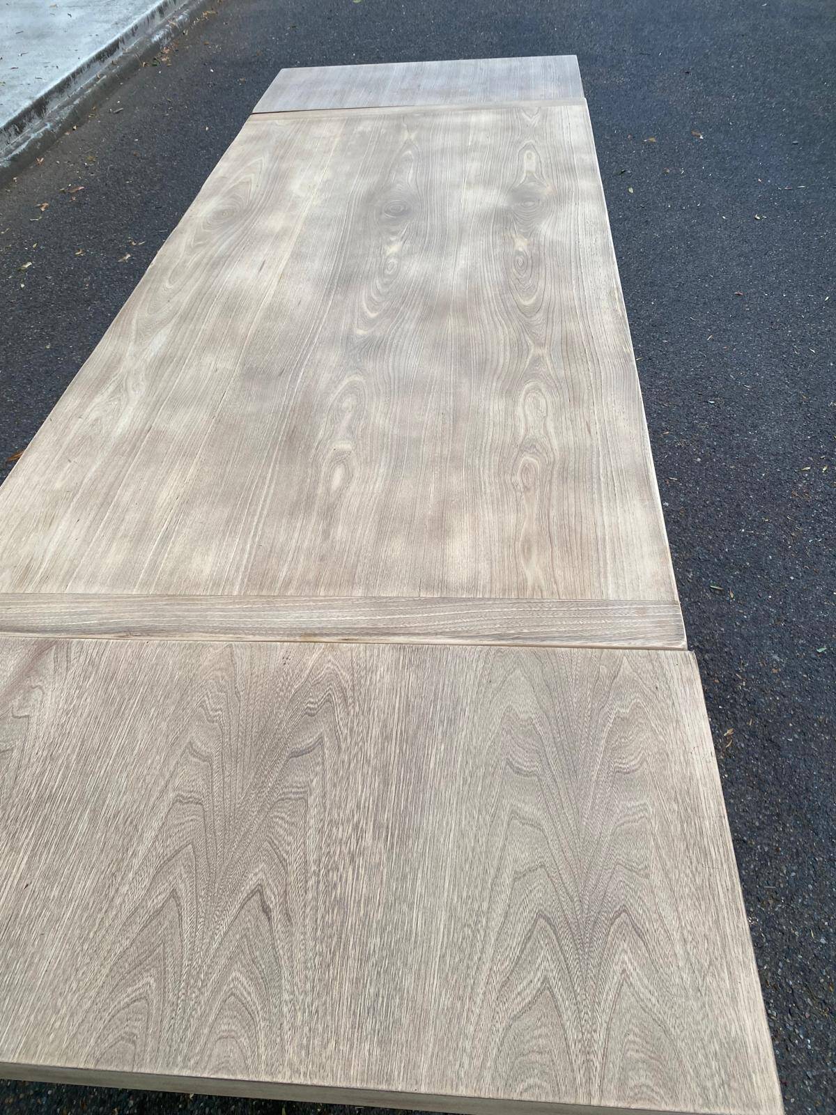 Extensible farmhouse dining table stripped in raw solid oak from the 1970s.