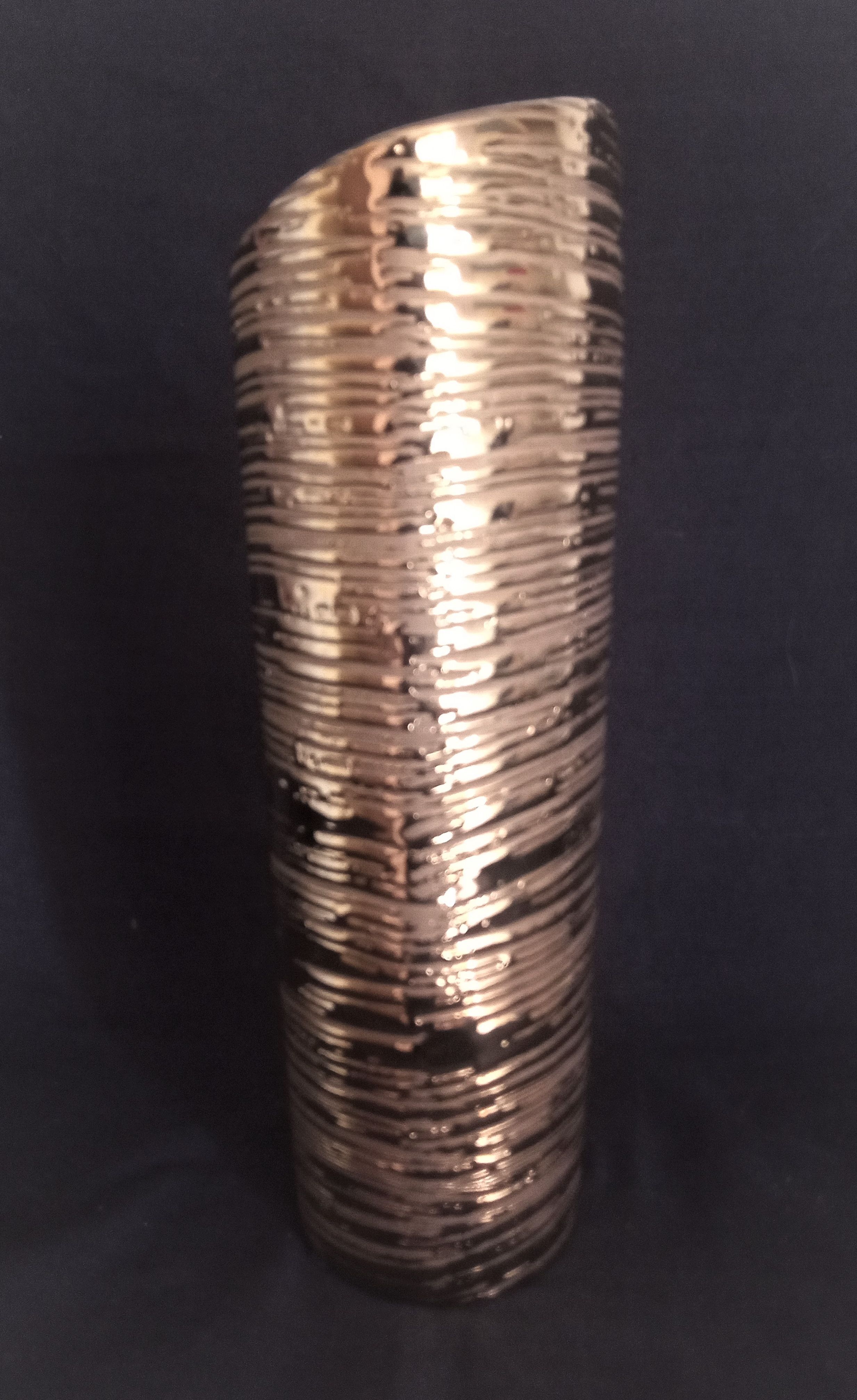 Cubist vase in gilded and ridged ceramic