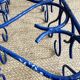 Pair of blue-painted wrought iron planters, 1960s