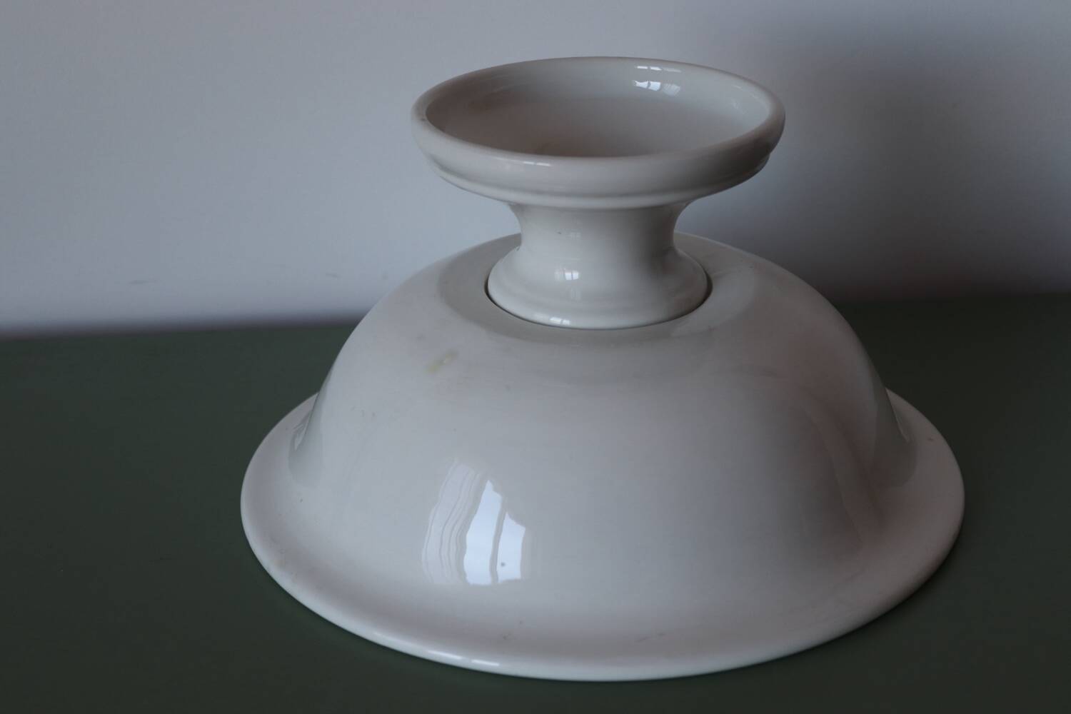 Large ceramic fruit bowl with red fruits