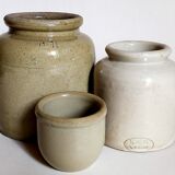 Set of three pots with old condiments in glazed earth