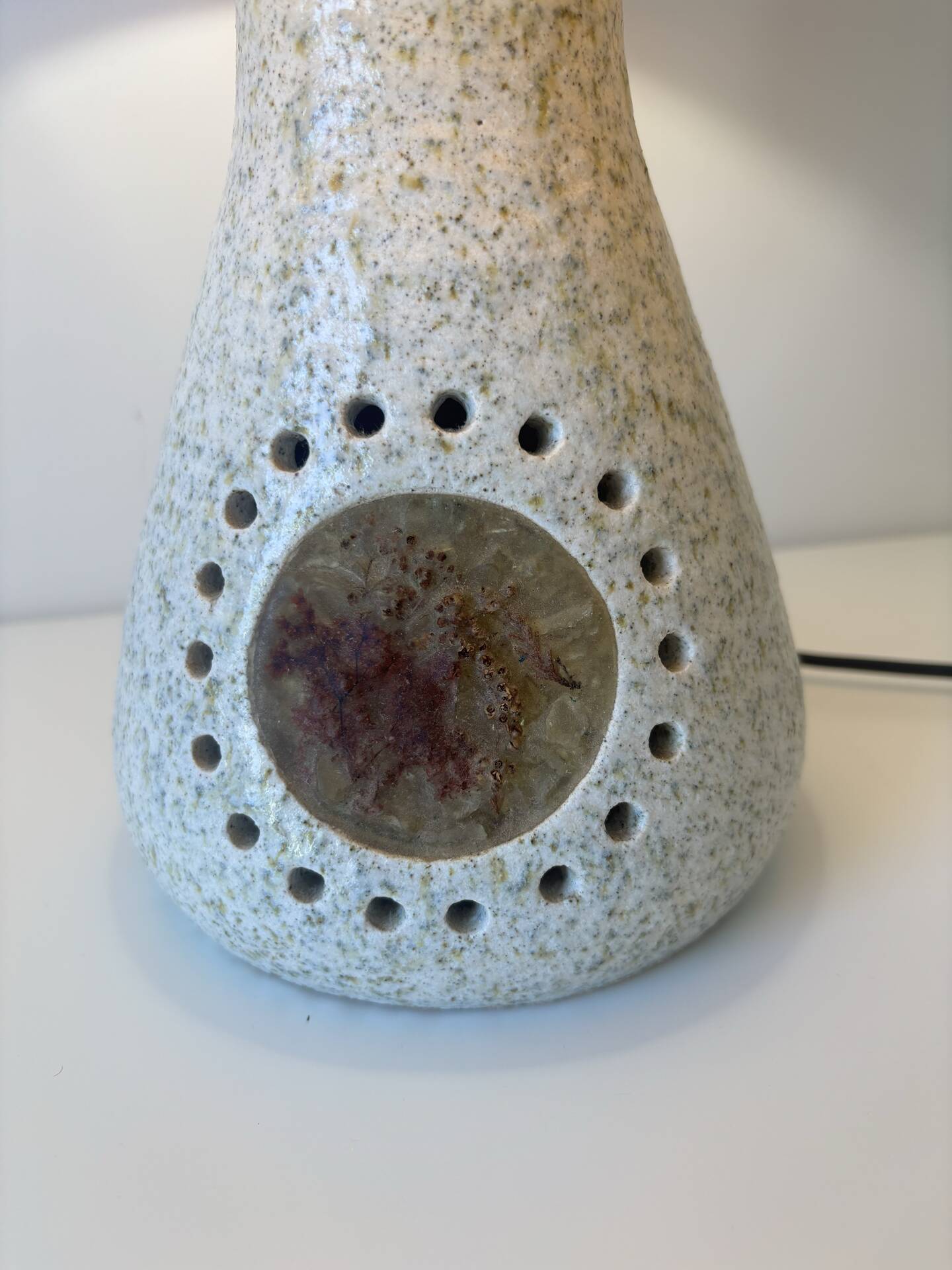 Accolay Lamp, the base in glazed ceramic with openwork decoration.