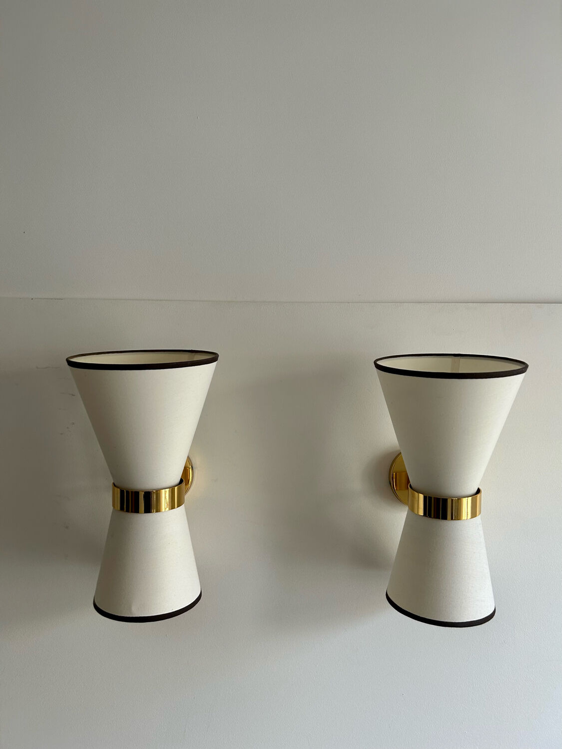 Pair of vintage wall lamps, brass and unbleached fabric, Italy 1980