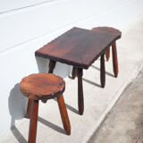 Set of coffee table and 2 carved wooden stools, brutalist