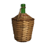Demijohn in wicker basket