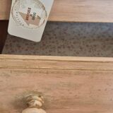 Small Parisian-style chest of drawers patinated in pink.