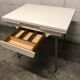 Off-white formica table / 70s cream with a tapered foot drawer