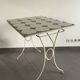 White wrought iron table