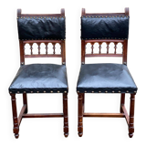 Two 19th-century Henri II chairs in solid wood and black leather upholstery
