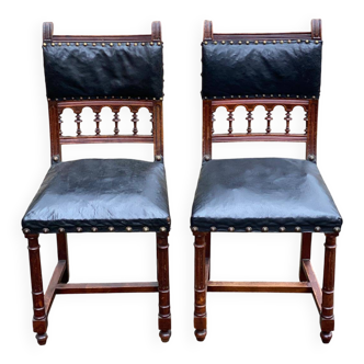 Two 19th-century Henri II chairs in solid wood and black leather upholstery