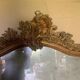 Large antique mirror in wood and gilded stucco.