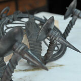 Pair of carved metal wall lamps signed RG