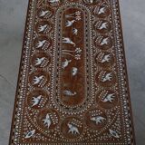 Vintage Indian teak coffee table inlaid with elephant motifs, mid-20th century.