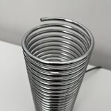 Massive chrome spring lamp
